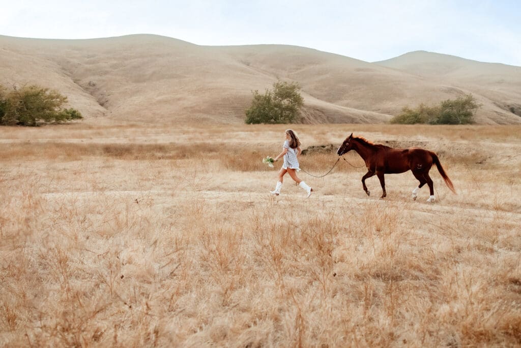 Class of 2027 senior portrait with a horse on California's Central Coast.