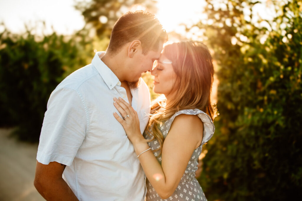 Backlit image of a couple embracing