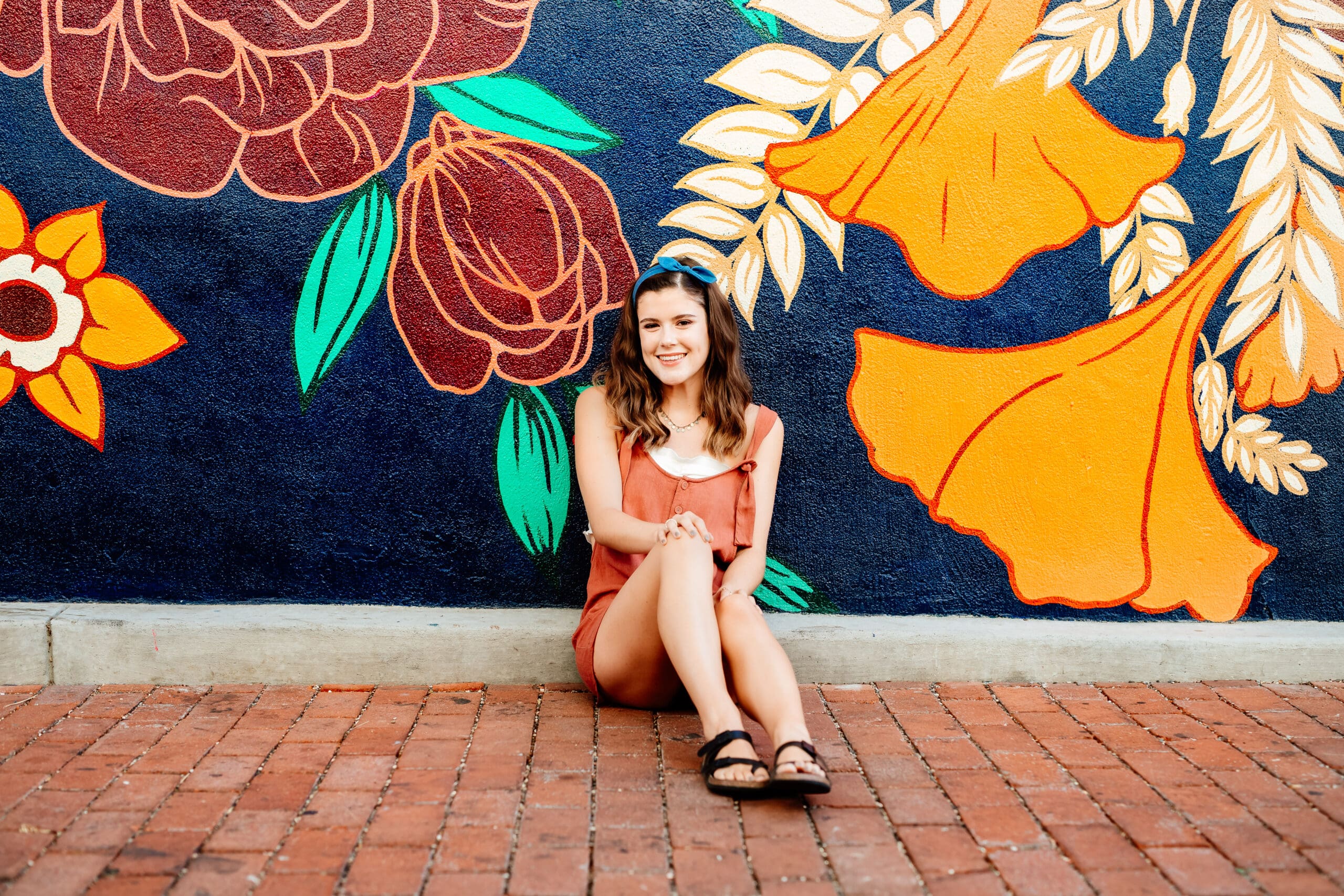 Colorful image of a senior girl for a blog post about what to wear for senior photos