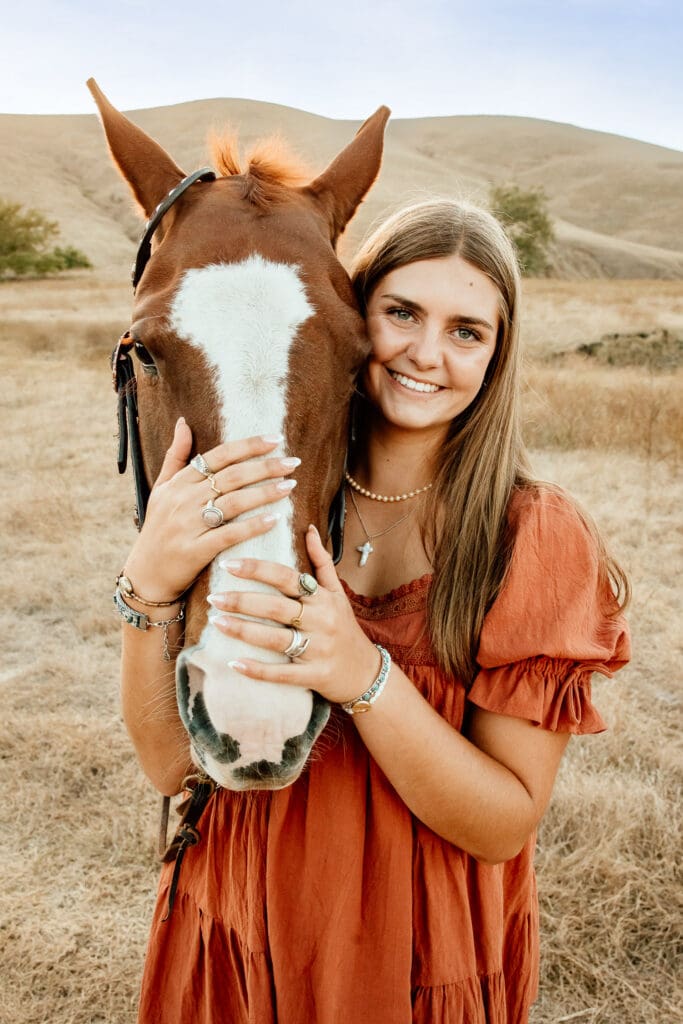 Class of 2027 senior portrait with a horse on California's Central Coast.