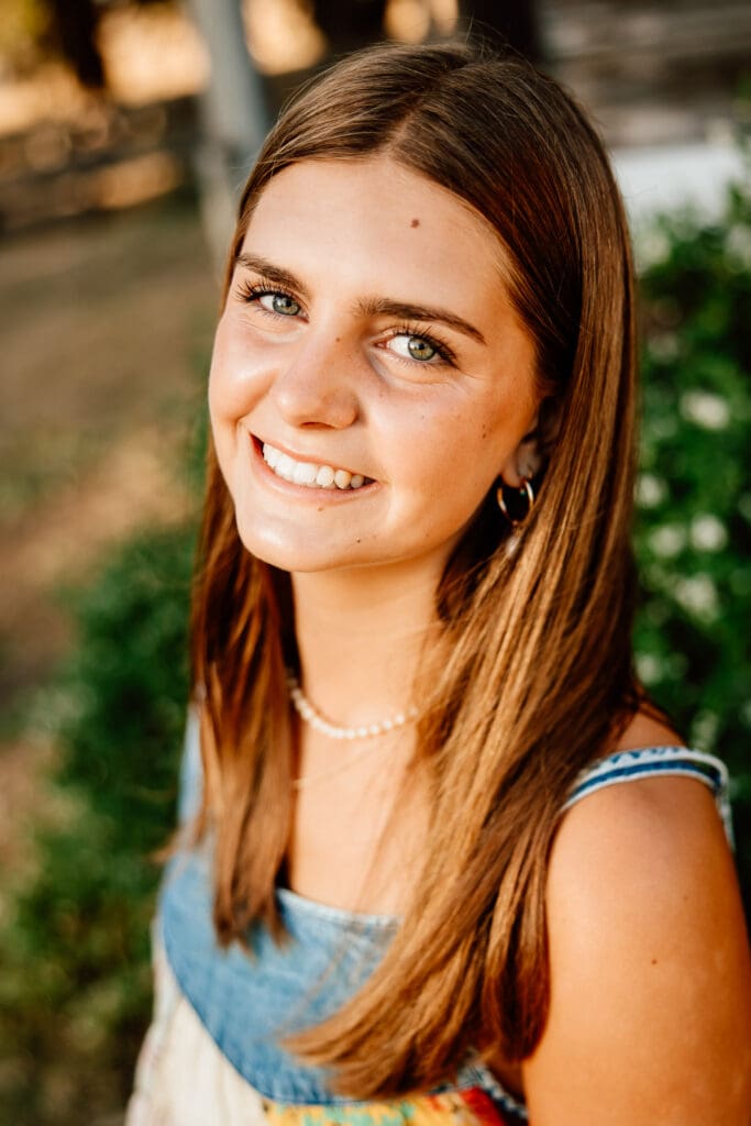 Senior portraits at a rustic barn in Cayucos.